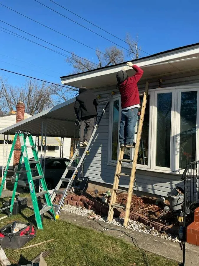 Restoration crew performing exterior repair in White Knoll